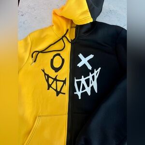 Yellow and Black Split Hoodie with Graphic Design